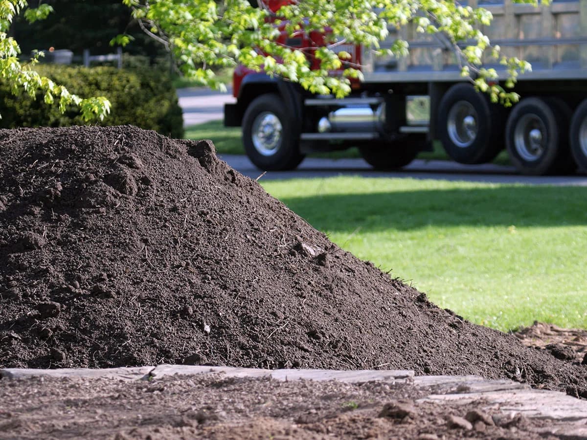 Topsoil Near Me: How to Find Quality Bulk Soil, Avoid Store Bag Scams & Estimate Yardage (2026)