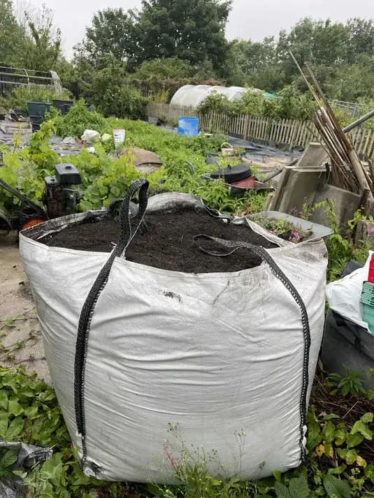 Topsoil Cost Guide 2026: Bulk Price Per Yard, Delivery & Bag Cost